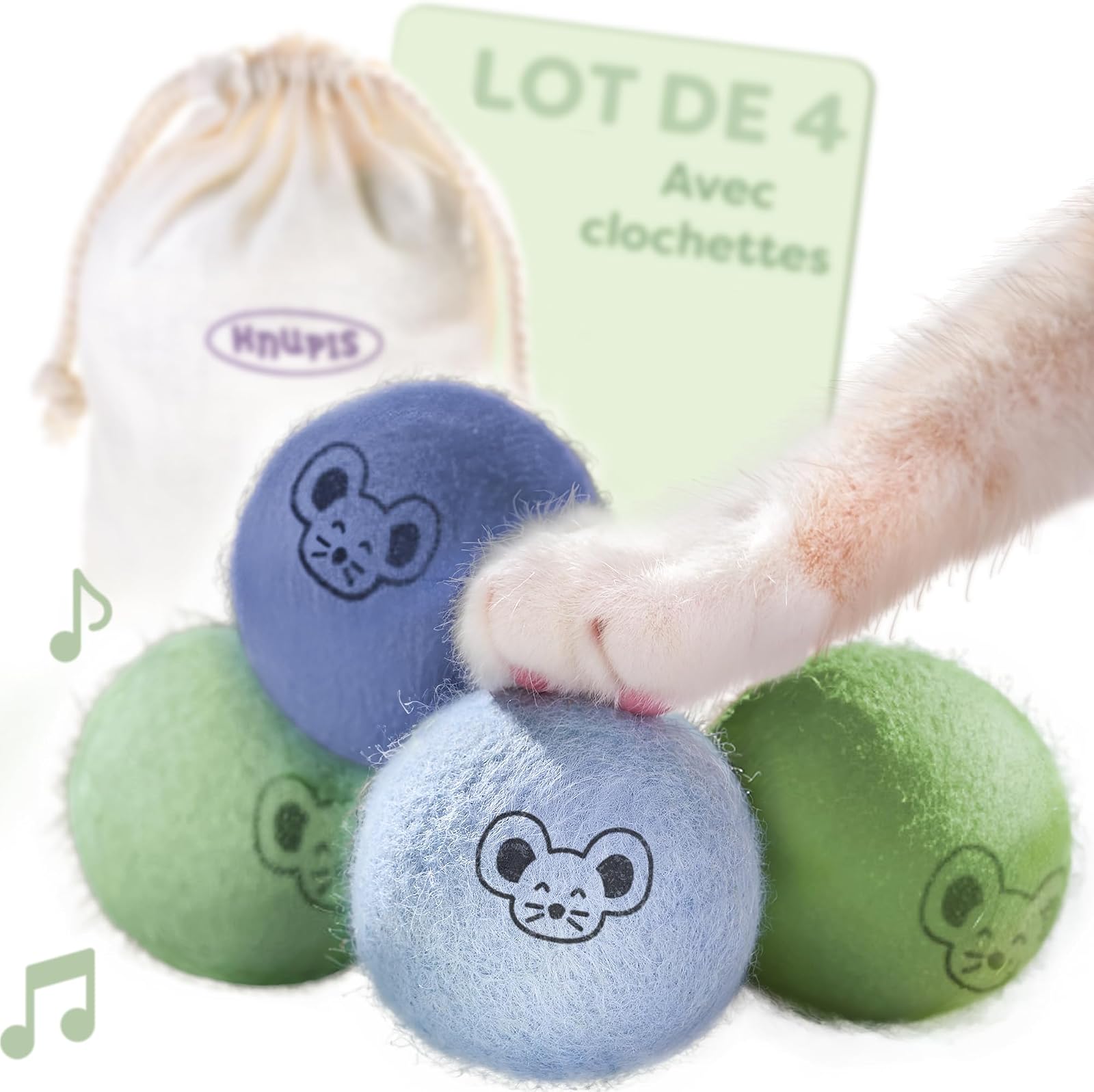 Balles en laine colorées pour chat avec un motif de tête de chat, touchées par une patte